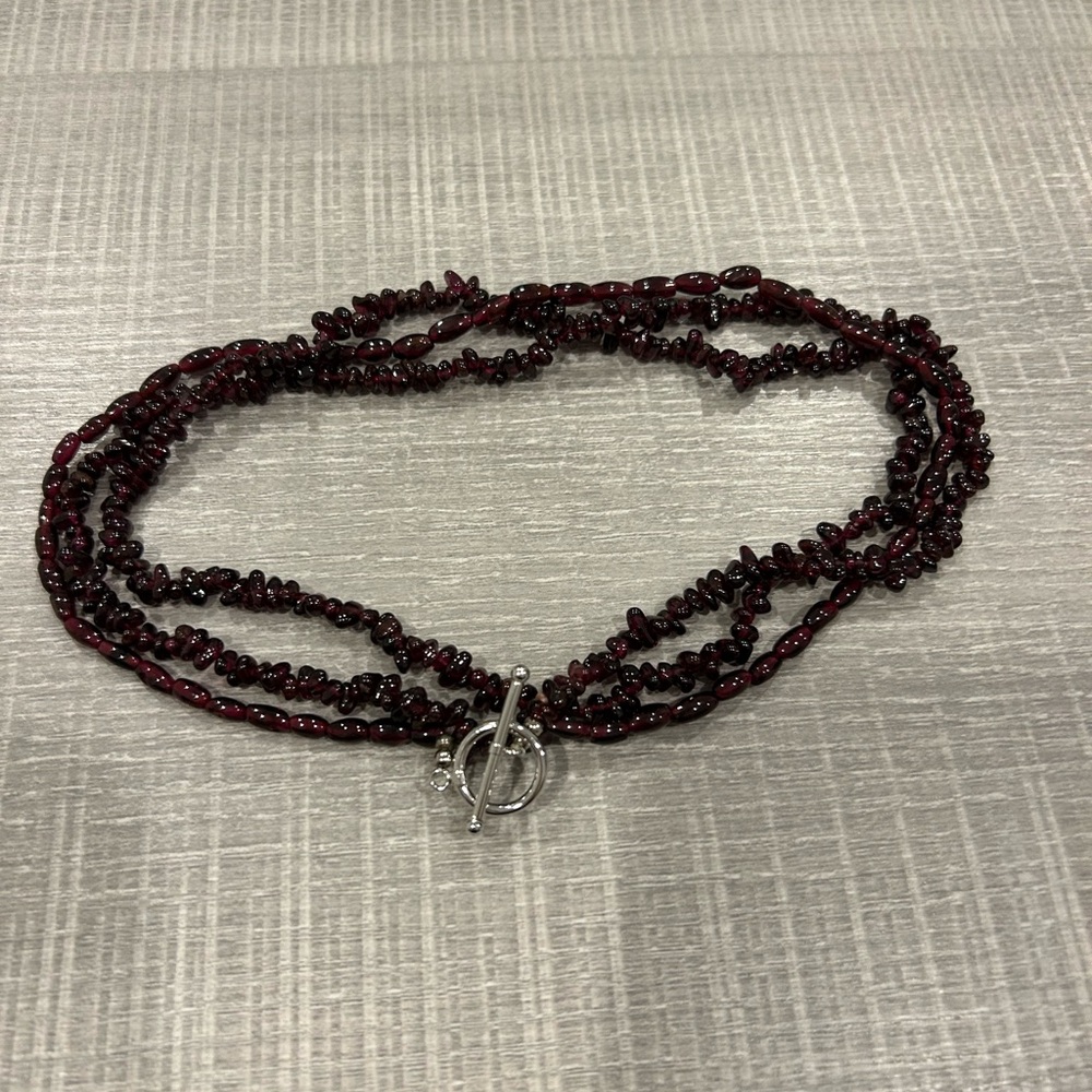 Elegant Garnet Beaded Necklace. Silver clasp.
